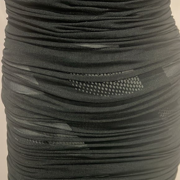 Never worn BCBG mesh overlay black dress asymmetrical designs underneath size XS - Picture 5 of 5